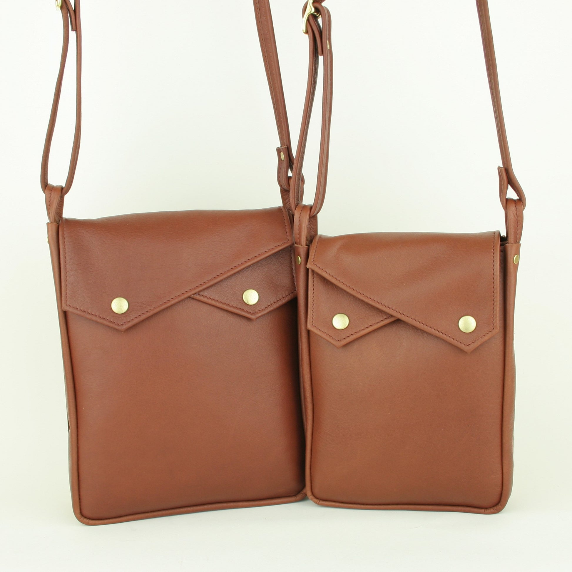 Soft, brown leather purses in small and large.