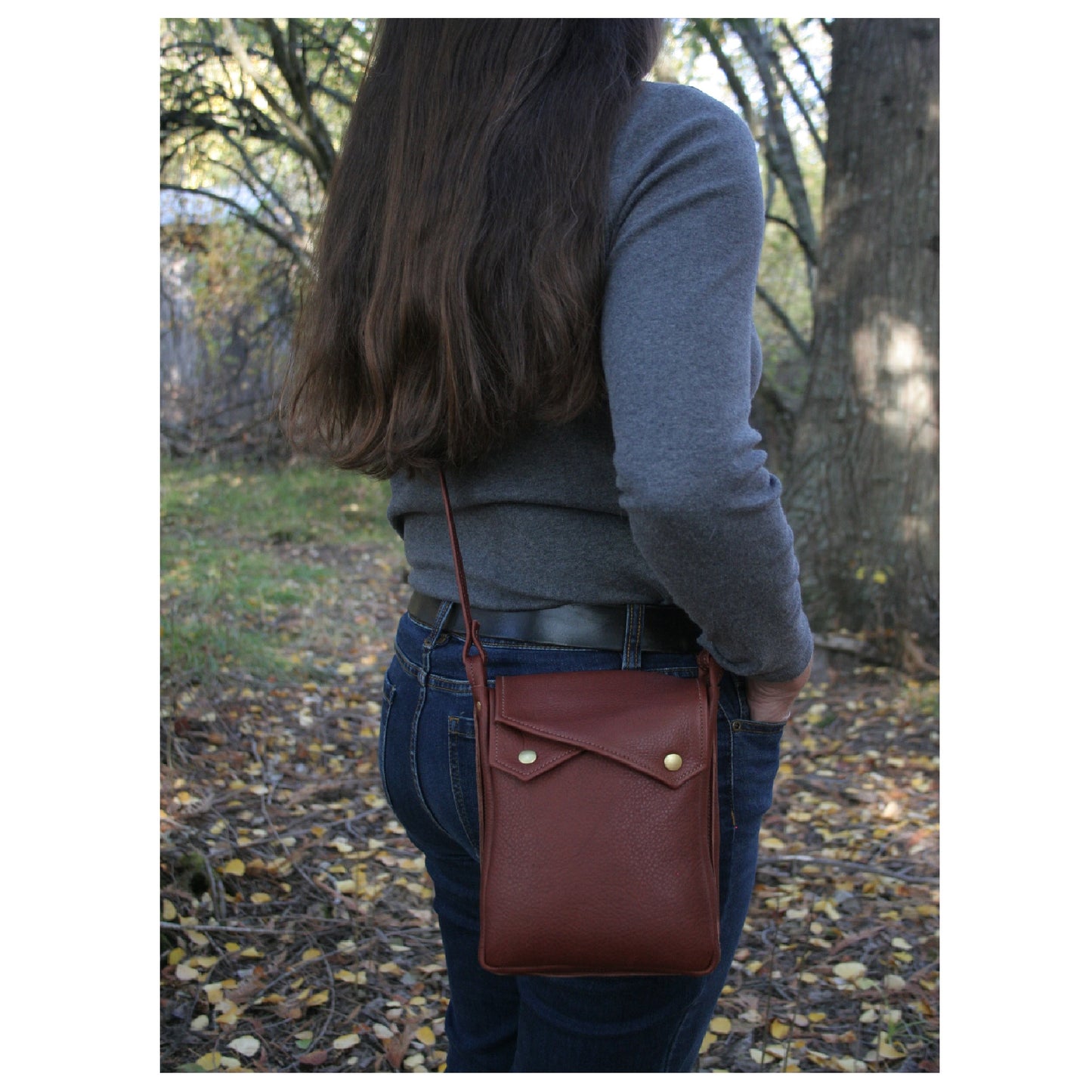 Leather purse with shoulder strap made in USA.